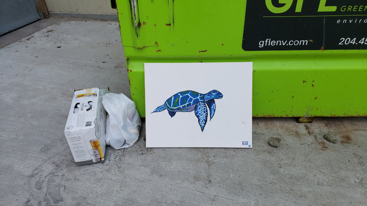 a small painting of a drowsy-looking turtle in a swimming position on a white background, on the street in a back alley leaning against a bright green dumpster. next to the dumpster is a small white garbage bag and a 12-pack of beer.