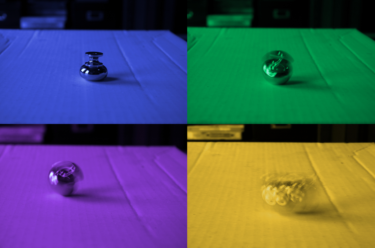 Four images in 2x2 arrangement of a metal object (drawer handle, but it's not easy to tell) in different stages/intensities of spinning. Each one is overlayed with a different colour: blue, green, purple, and yellow